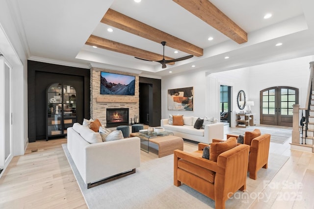 17416 Gillican Overlook Rd, Davidson, NC 28036 - living area with light wood-style floors, ceiling fan, recessed lighting, french doors, and beam ceiling