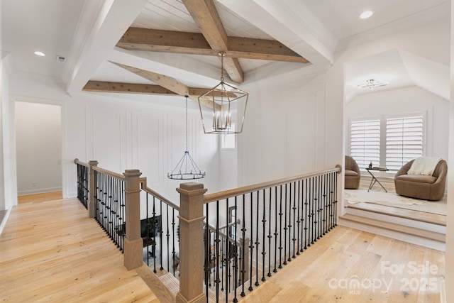 17416 Gillican Overlook Rd, Davidson, NC 28036 - hall with a chandelier, an upstairs landing, wood-type flooring, and beamed ceiling