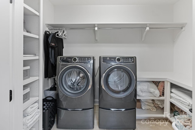 17416 Gillican Overlook Rd, Davidson, NC 28036 - washroom featuring washer and dryer and tile patterned floors