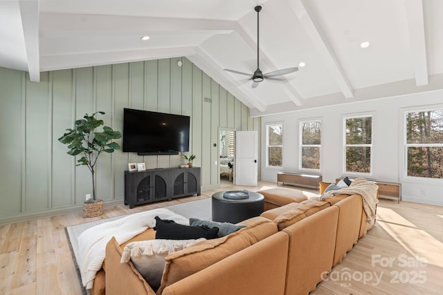 17416 Gillican Overlook Rd, Davidson, NC 28036 - living room with light wood finished floors, ceiling fan, and a decorative wall