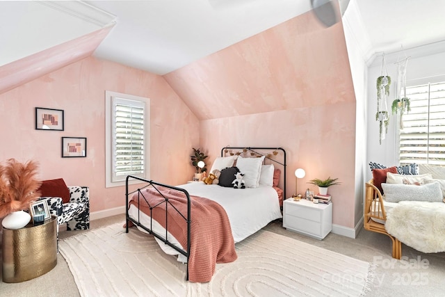 17416 Gillican Overlook Rd, Davidson, NC 28036 - bedroom with light colored carpet, multiple windows, vaulted ceiling, and baseboards