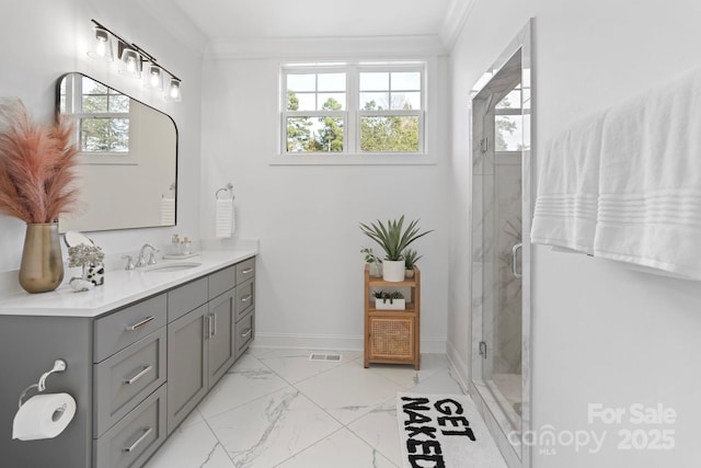 17416 Gillican Overlook Rd, Davidson, NC 28036 - full bathroom with vanity, ornamental molding, plenty of natural light, a stall shower, and marble finish floors