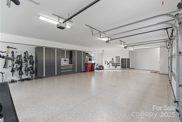 17416 Gillican Overlook Rd, Davidson, NC 28036 - garage featuring electric panel and a garage door opener