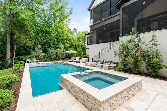 17416 Gillican Overlook Rd, Davidson, NC 28036 - view of pool with a patio, a sunroom, stairs, a pool with connected hot tub, and outdoor lounge area