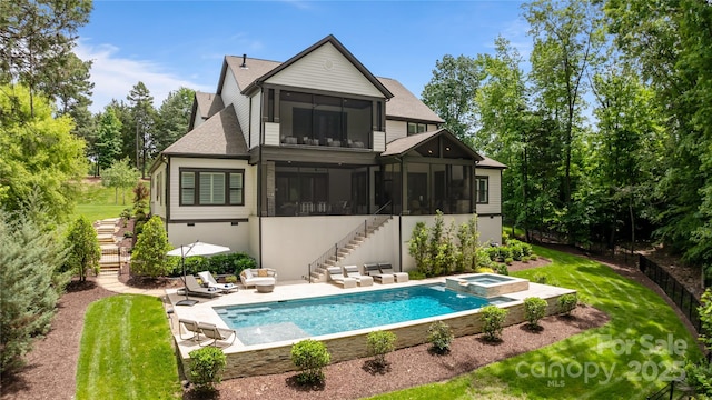 17416 Gillican Overlook Rd, Davidson, NC 28036 - rear view of property with stairs, a sunroom, a shingled roof, and a lawn