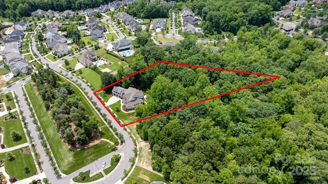 17416 Gillican Overlook Rd, Davidson, NC 28036 - aerial view of residential area with property parcel outlined and a heavily wooded area