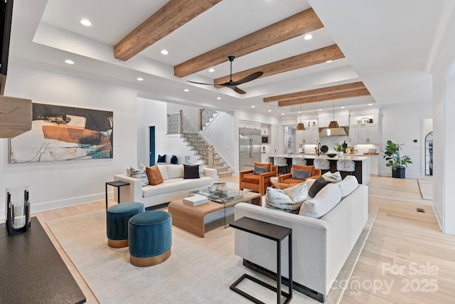17416 Gillican Overlook Rd, Davidson, NC 28036 - living area with recessed lighting, stairs, ceiling fan, beam ceiling, and light wood-style floors