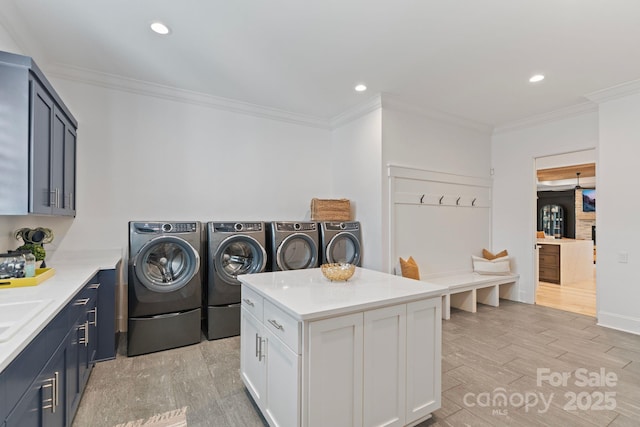 17416 Gillican Overlook Rd, Davidson, NC 28036 - laundry area featuring separate washer and dryer, light wood-style flooring, ornamental molding, cabinet space, and recessed lighting