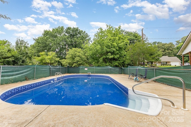 128 Paul Snipes Rd, Lancaster, SC 29720 - view of swimming pool with a fenced backyard and view of scattered trees