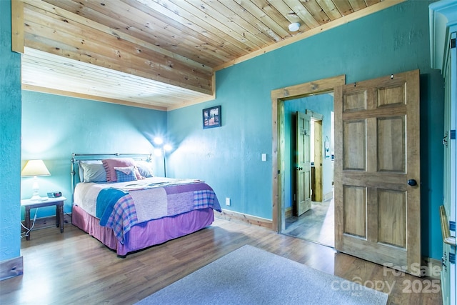 58 Great Aspen Way, Black Mountain, NC 28711 - bedroom with wood ceiling, wood finished floors, and baseboards