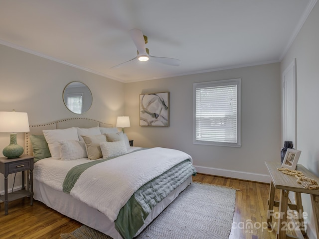 1069 Sedgefield Rd, Charlotte, NC 28209 - bedroom featuring crown molding, wood finished floors, baseboards, and ceiling fan