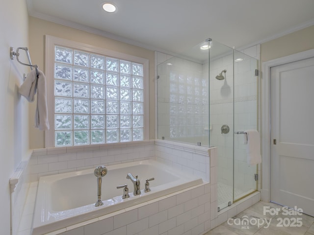1069 Sedgefield Rd, Charlotte, NC 28209 - full bathroom with a garden tub, a shower stall, tile patterned floors, ornamental molding, and recessed lighting