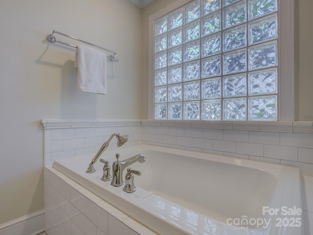 1069 Sedgefield Rd, Charlotte, NC 28209 - full bath with healthy amount of natural light and a bath