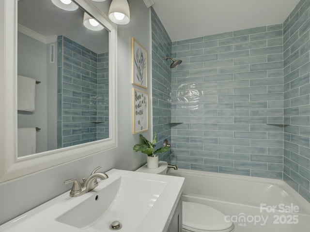 1069 Sedgefield Rd, Charlotte, NC 28209 - full bathroom with vanity, toilet, bathing tub / shower combination, and ornamental molding