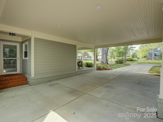 1069 Sedgefield Rd, Charlotte, NC 28209 - view of patio / terrace featuring entry steps and a carport