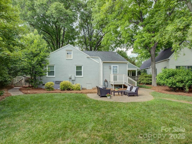 1069 Sedgefield Rd, Charlotte, NC 28209 - rear view of property featuring an outdoor living space, a patio, and brick siding