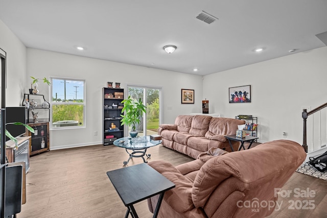 5207 Maynard Hill Dr, Monroe, NC 28110 - living area with wood finished floors, recessed lighting, and baseboards