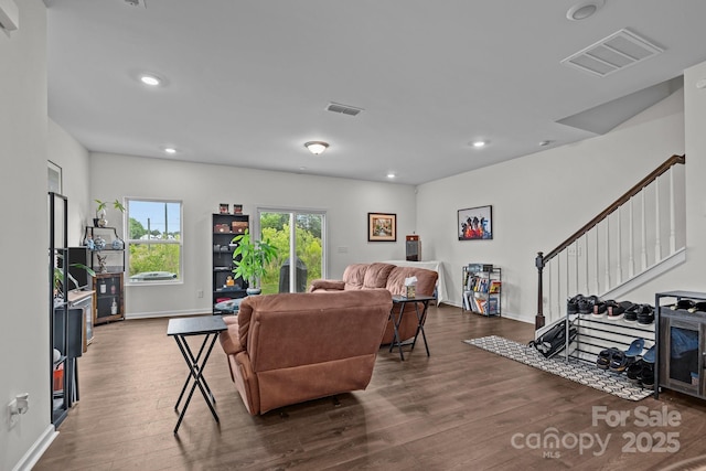 5207 Maynard Hill Dr, Monroe, NC 28110 - living area featuring wood finished floors, recessed lighting, baseboards, and stairs