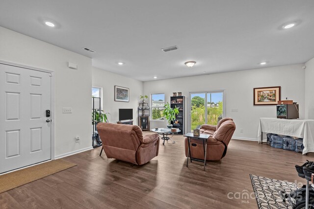 5207 Maynard Hill Dr, Monroe, NC 28110 - living area with dark wood-type flooring, baseboards, and recessed lighting