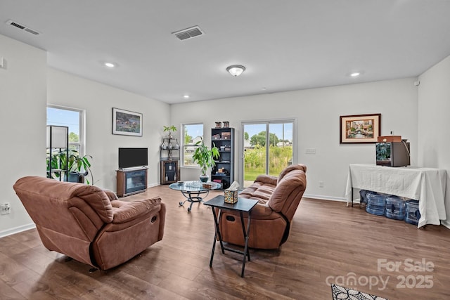 5207 Maynard Hill Dr, Monroe, NC 28110 - living room with dark wood-type flooring, baseboards, and recessed lighting