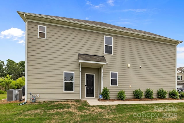 5207 Maynard Hill Dr, Monroe, NC 28110 - back of property with central AC unit and a yard