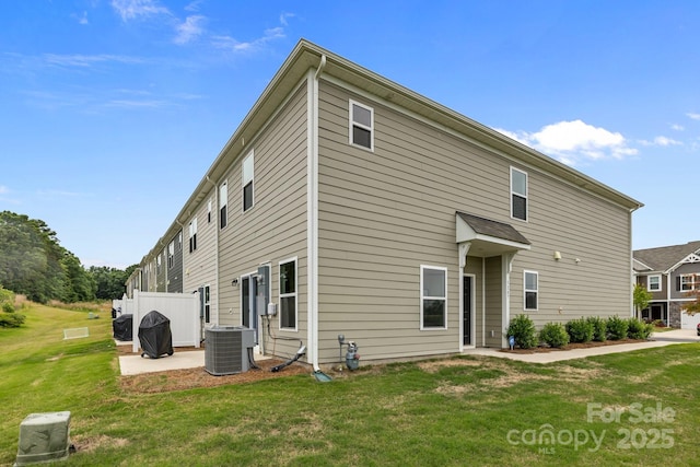 5207 Maynard Hill Dr, Monroe, NC 28110 - rear view of property featuring central AC unit and a yard