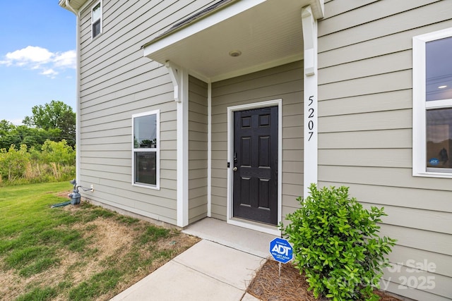 5207 Maynard Hill Dr, Monroe, NC 28110 - view of exterior entry featuring a lawn