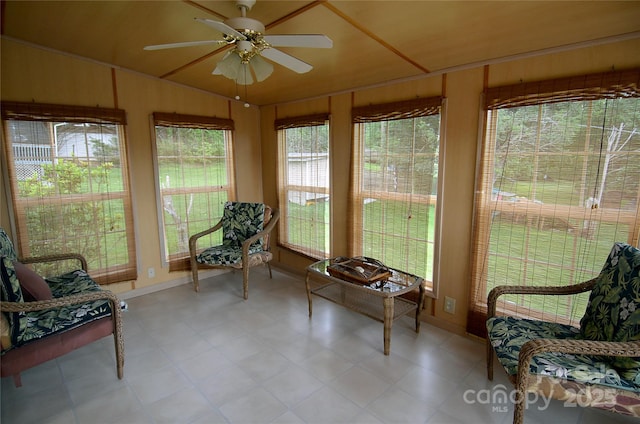 60 3rd St, Marion, NC 28752 - sunroom with tile patterned floors, baseboards, wooden walls, and vaulted ceiling