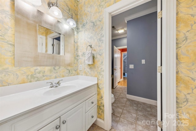 3932 Rounding Run Rd, Charlotte, NC 28277 - bathroom with crown molding, baseboards, vanity, toilet, and wallpapered walls