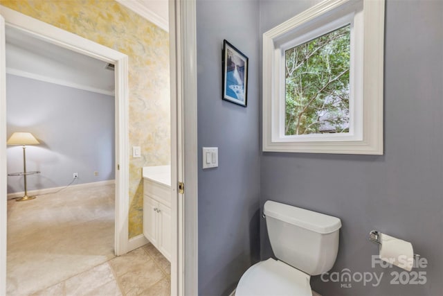 3932 Rounding Run Rd, Charlotte, NC 28277 - bathroom featuring vanity, toilet, baseboards, and ornamental molding
