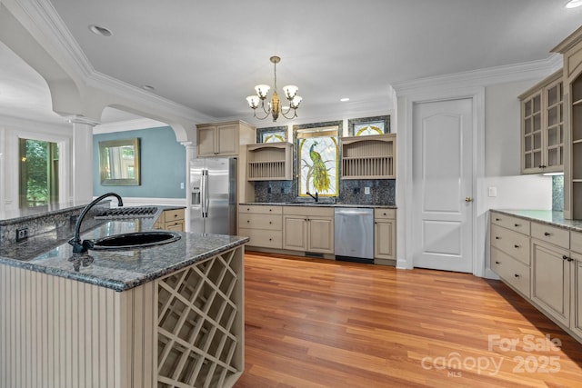 3932 Rounding Run Rd, Charlotte, NC 28277 - kitchen with appliances with stainless steel finishes, open shelves, decorative columns, healthy amount of natural light, and crown molding
