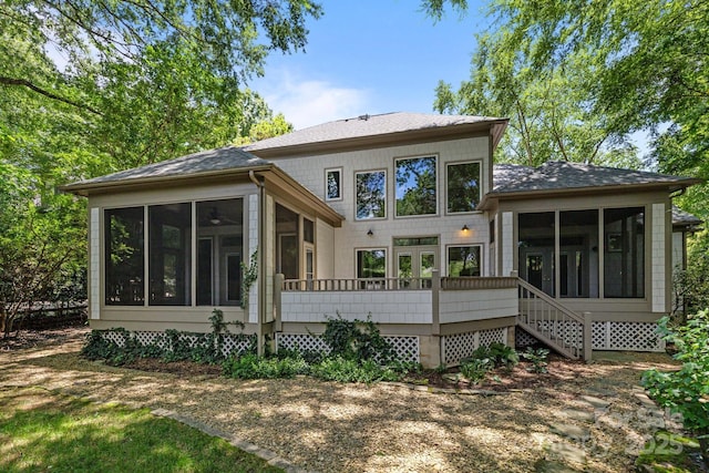 3932 Rounding Run Rd, Charlotte, NC 28277 - back of property featuring a sunroom, a shingled roof, and stairway