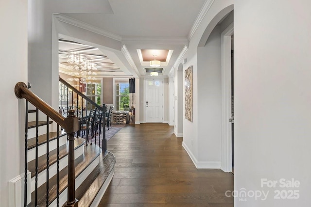 8514 Ellington Park Dr, Charlotte, NC 28277 - foyer featuring hardwood / wood-style floors, arched walkways, a chandelier, crown molding, and stairs