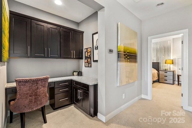 8514 Ellington Park Dr, Charlotte, NC 28277 - office area with light carpet, built in study area, baseboards, and recessed lighting