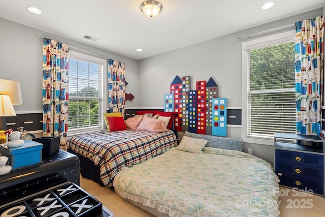 8514 Ellington Park Dr, Charlotte, NC 28277 - carpeted bedroom with multiple windows and recessed lighting