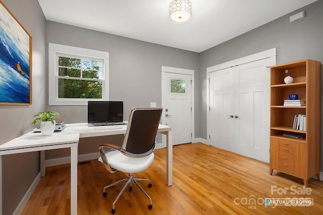 200 N Skyloft Dr Unit 2, Asheville, NC 28801 - office area featuring plenty of natural light, light wood finished floors, and baseboards