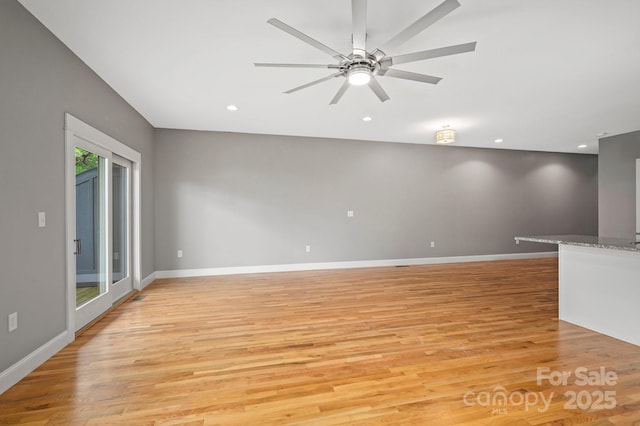 200 N Skyloft Dr Unit 2, Asheville, NC 28801 - spare room with light wood-type flooring, baseboards, a ceiling fan, and recessed lighting