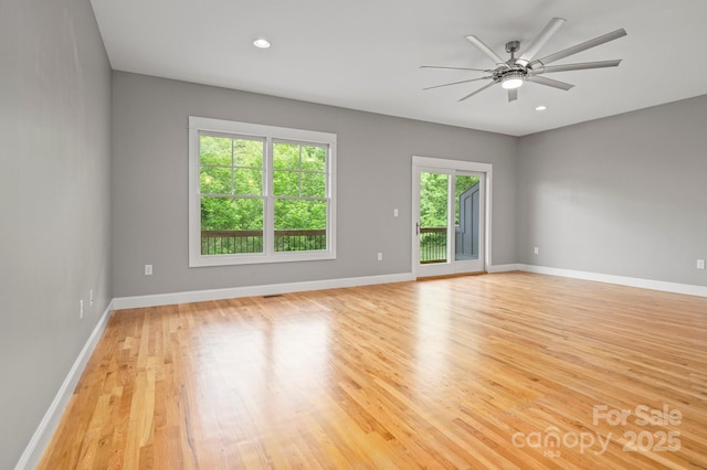 200 N Skyloft Dr Unit 2, Asheville, NC 28801 - unfurnished room with light wood finished floors, a ceiling fan, baseboards, and recessed lighting