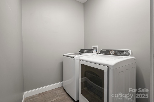 200 N Skyloft Dr Unit 2, Asheville, NC 28801 - washroom featuring washer and dryer and baseboards