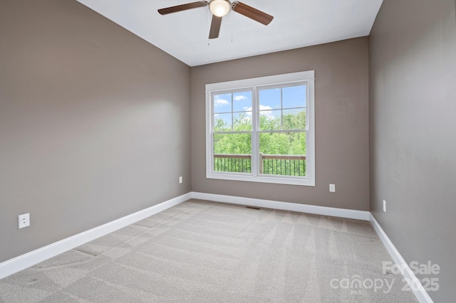 200 N Skyloft Dr Unit 2, Asheville, NC 28801 - empty room featuring a ceiling fan, baseboards, and light colored carpet