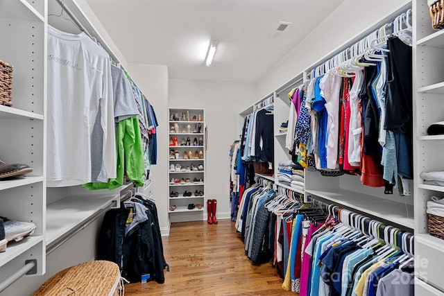 walk in closet featuring light wood-type flooring