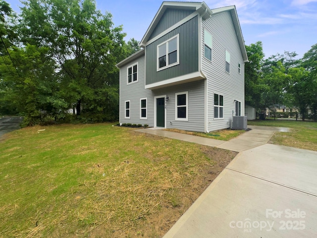746 Shasta St NW, Concord, NC 28027 - view of front of home with cooling unit and a front yard