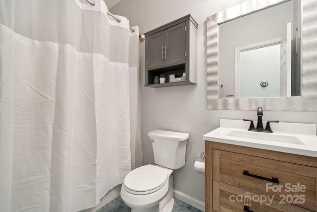 full bathroom with toilet, vanity, baseboards, and curtained shower