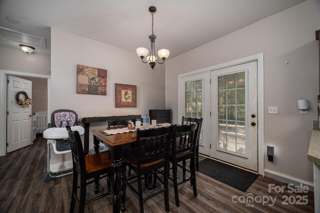 167 Brown Watterson Rd, Cherryville, NC 28021 - dining space with wood finished floors, baseboards, and a chandelier