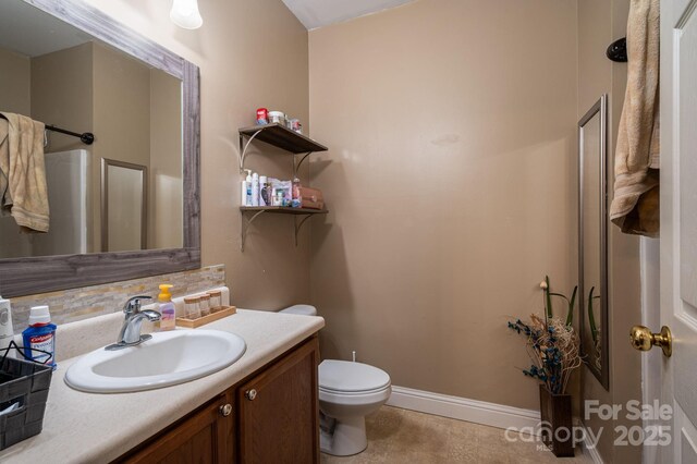 167 Brown Watterson Rd, Cherryville, NC 28021 - bathroom with vanity, baseboards, and toilet