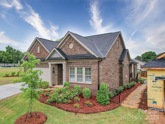 405 Newstyle Way, Gastonia, NC 28056 - craftsman-style home with brick siding, a shingled roof, an attached garage, and driveway