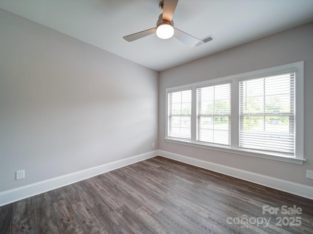 405 Newstyle Way, Gastonia, NC 28056 - empty room featuring baseboards, dark wood-type flooring, and a ceiling fan