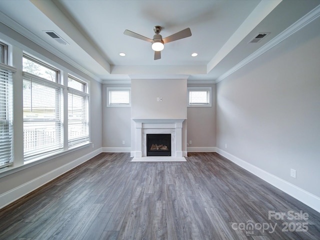 405 Newstyle Way, Gastonia, NC 28056 - unfurnished living room with dark wood finished floors, a tray ceiling, ceiling fan, a premium fireplace, and baseboards