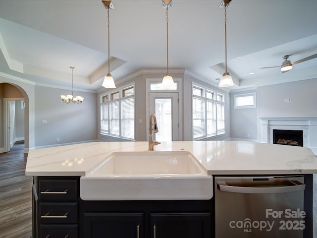 405 Newstyle Way, Gastonia, NC 28056 - kitchen featuring a raised ceiling, dishwasher, open floor plan, a sink, and ornamental molding