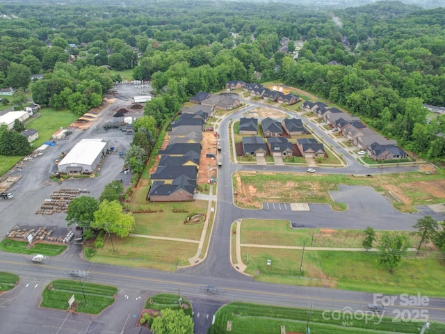 405 Newstyle Way, Gastonia, NC 28056 - aerial view of property and surrounding area with a heavily wooded area